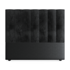 Black upholstered headboard with a striped design on a white background
