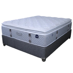 Mattress on a gray platform with a neutral background