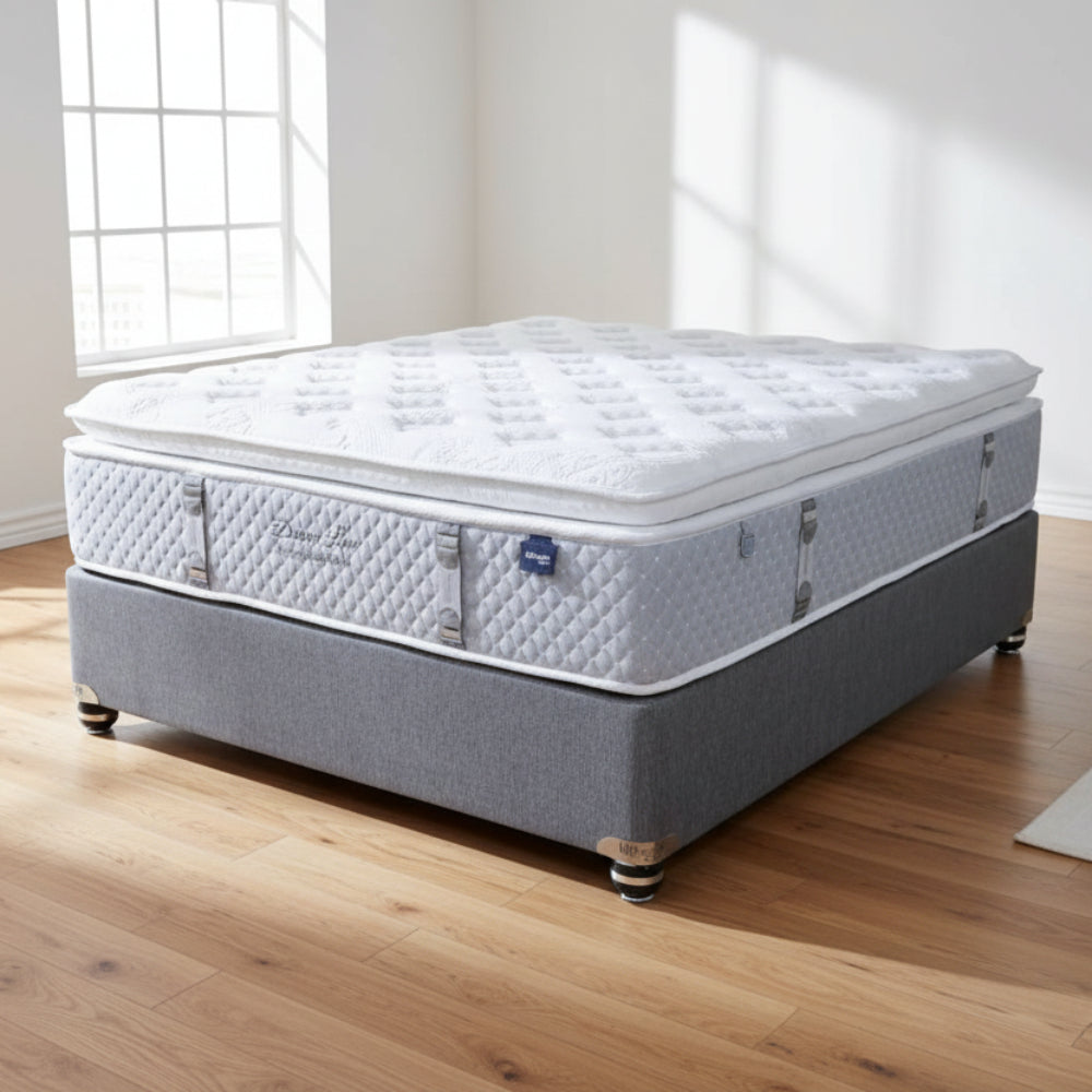 Mattress on a gray platform with a neutral background