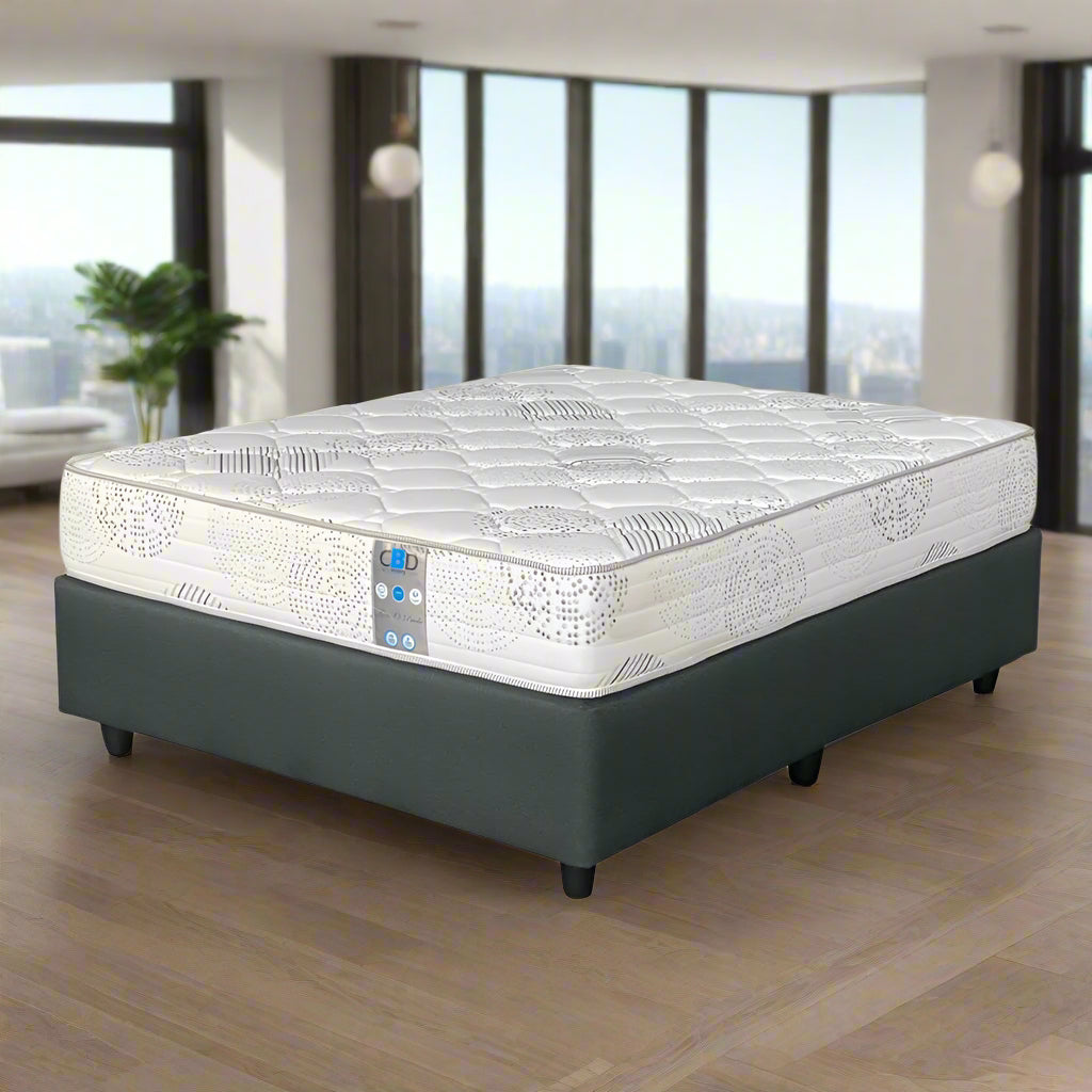 A three quarter size bed with a white and gray patterned mattress on a black base, set on six Reinforced cup legs.