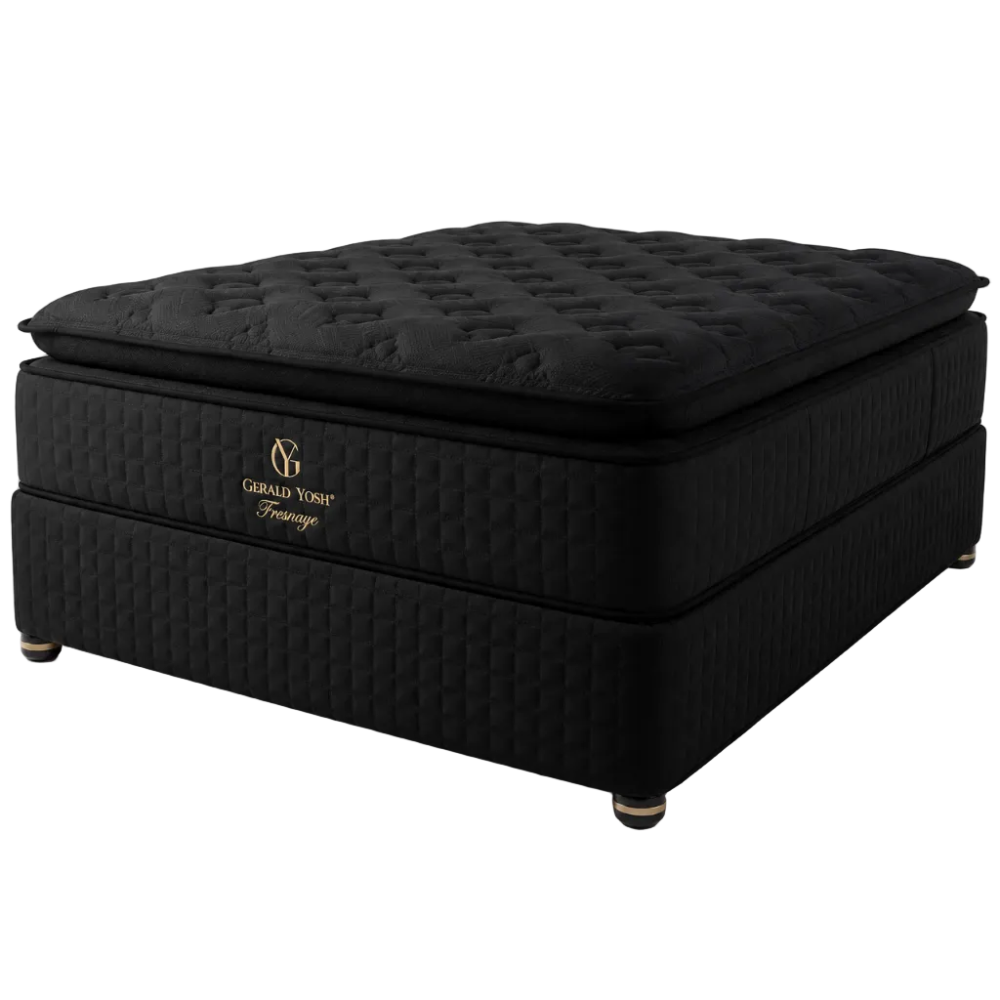 A black quilted box spring mattress with a tufted top cushion, featuring a gold 'Gerald Nye Furniture' logo on the side, shown on a white background.