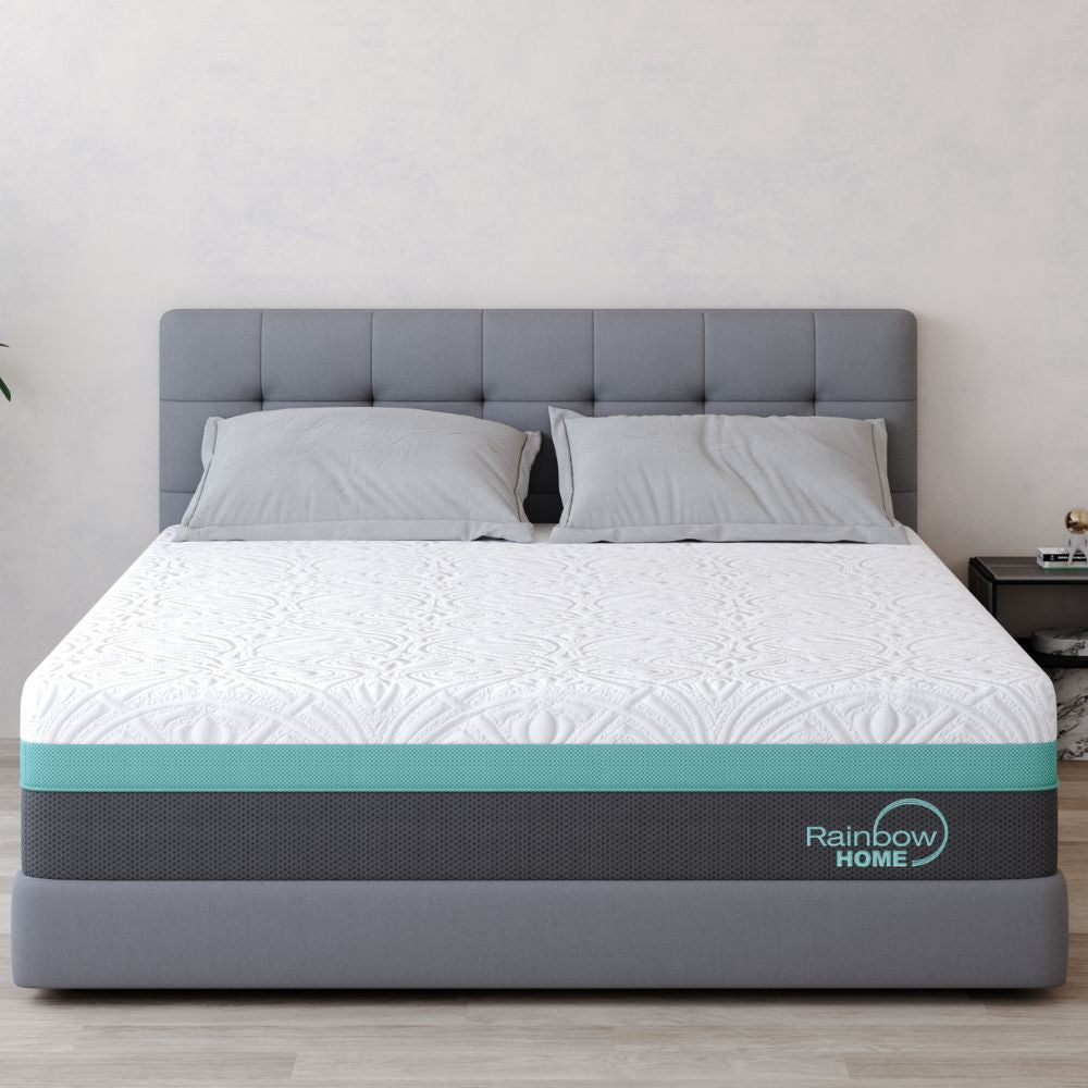 A queen-sized mattress with a gray and white color scheme, featuring a label that reads 'Rainbow Home.