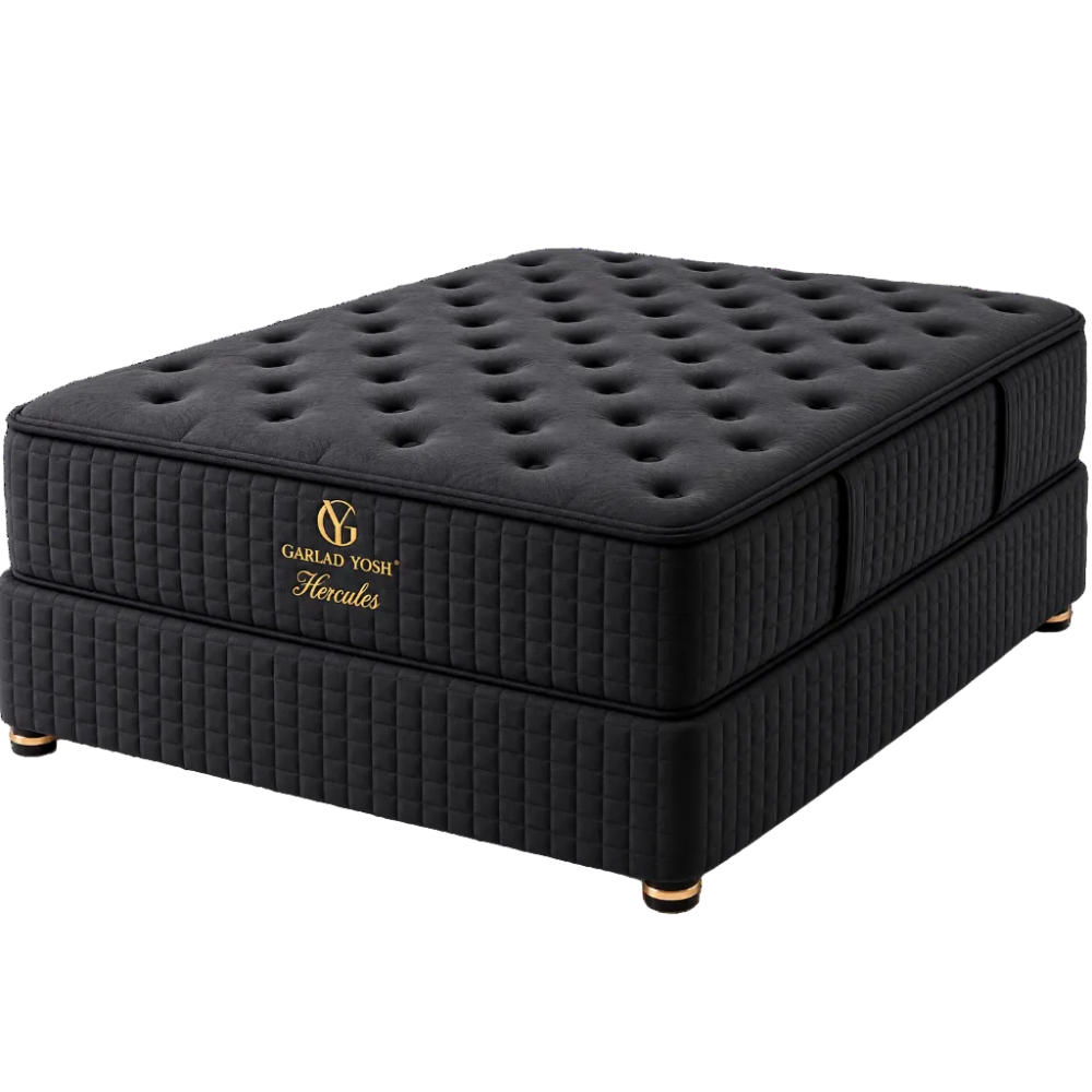 A black tufted mattress on a matching quilted base, branded with a gold logo that reads Garlad Yosh Hercules, shown on a clean white background.