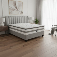 Gray mattress with white base on a white background