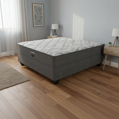 Gray mattress with a textured surface on a white background