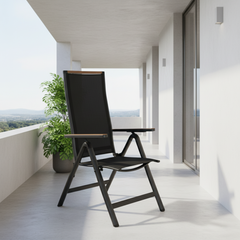 Black folding chair with wooden armrests on a white background