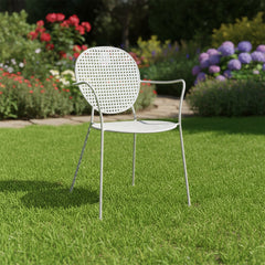 Light gray chair with a perforated backrest on a white background