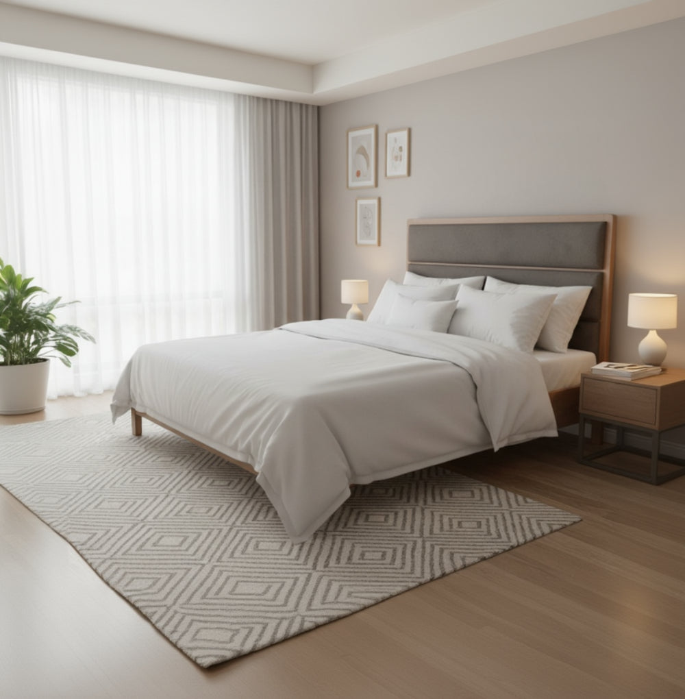 Gray upholstered headboard with wooden frame on a white background