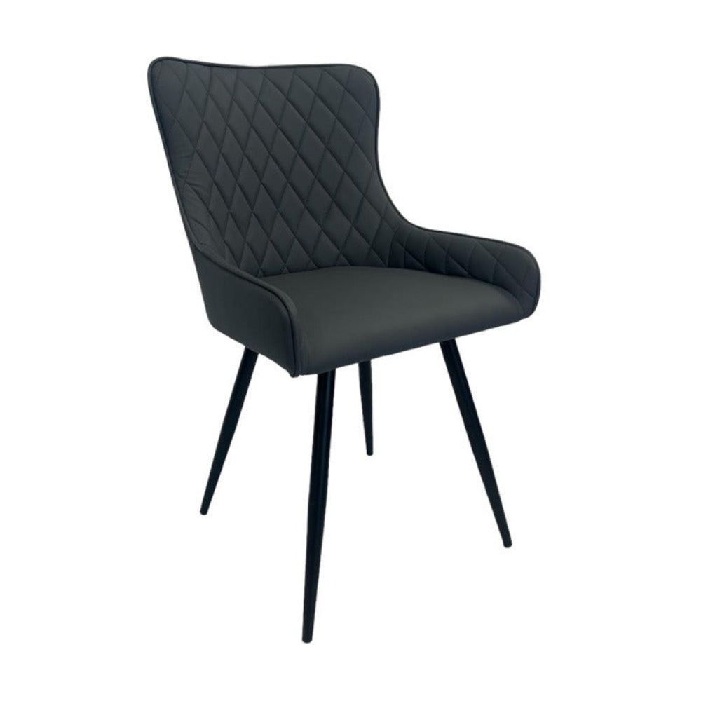 Black quilted chair with metal legs on a white background