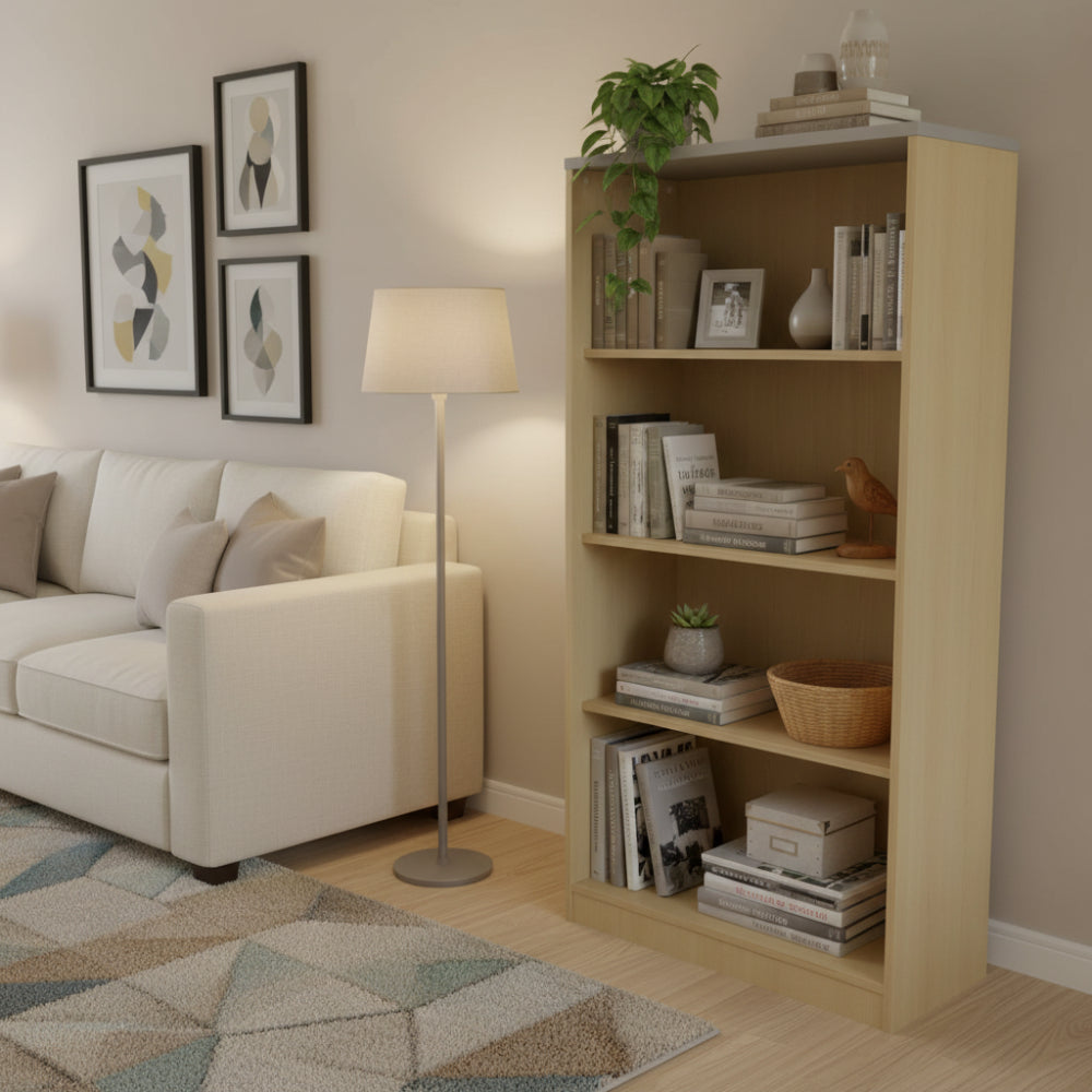 Wooden bookshelf with four shelves on a white background