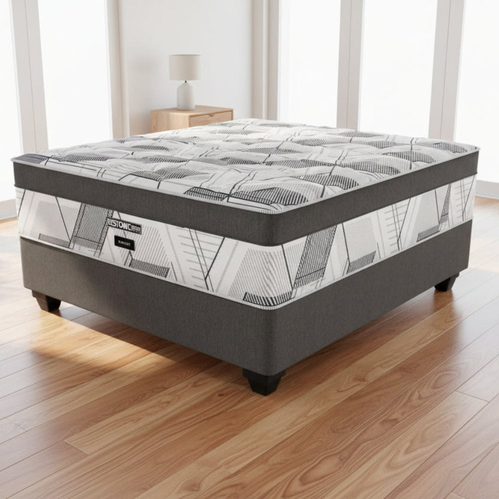 Gray and white mattress with a geometric pattern on a white background