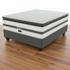 Gray and white mattress with 'Bestonic' branding on a white background