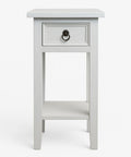 White side table with a drawer on a white background