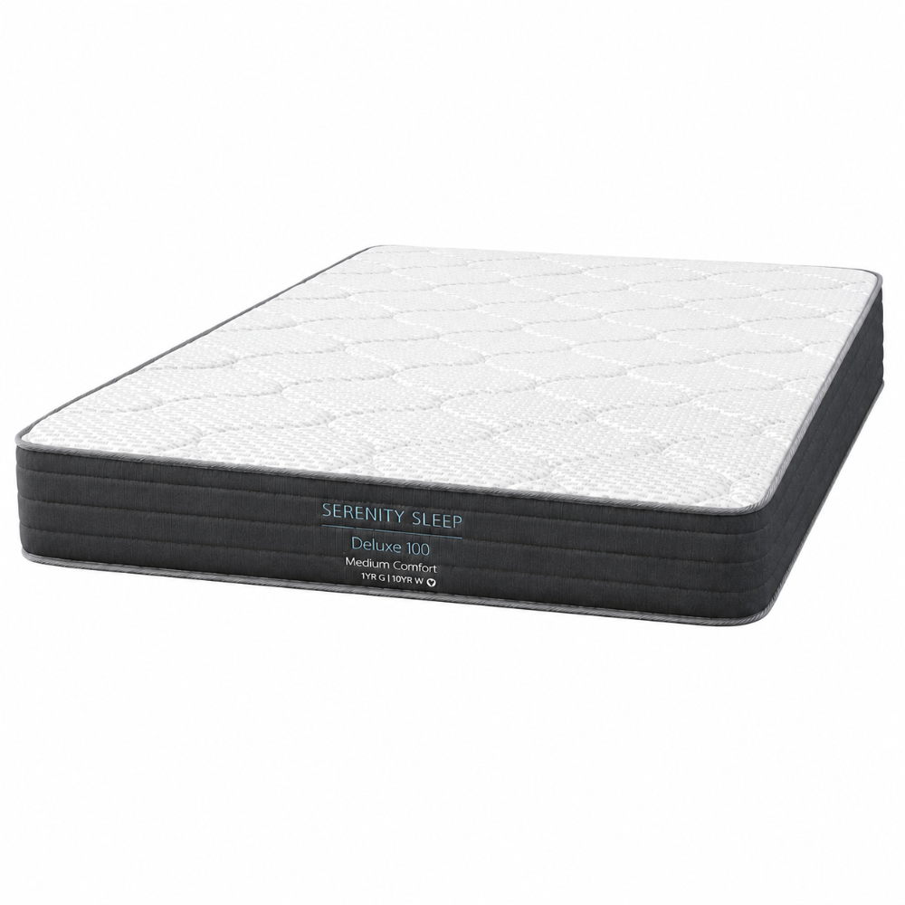 A Serenity Sleep Deluxe XQ medium comfort mattress shown at an angle on a solid white background.