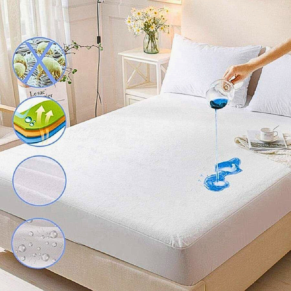 Mattress protector being demonstrated on a bed with water being poured onto it.